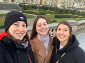 Demetria, Olivia & Maria in front of Royal Palace