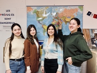 Olivia, Ioana, Maria & Demetria showing Moldova on the map